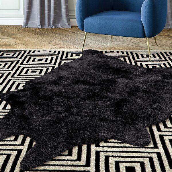 Sonnier Faux Sheepskin Black Area Rug by Willa Arlo Interiors